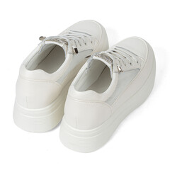 White Leather Women's Casual Comfortable Fashionable Sneakers with Lacing on Thick Rubber Sole Photo on White Background for Online Shopping Catalog