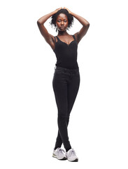 Fototapeta premium The African black woman strikes a confident and natural pose in her casual outfit, showcased beautifully against an isolated PNG background.