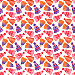 Watercolor seamless pattern with winter sweaters, hats and mittens. Christmas clothing