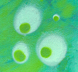 Colorful aerosol street wall background. Urban modern art texture. Wallpaper design backdrop pattern. Painted city wall close up.