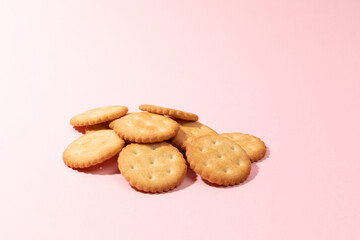 Biscuits on a pink background