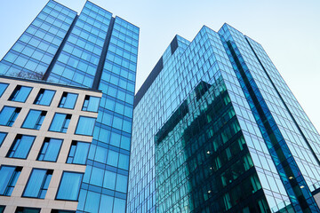 Fototapeta na wymiar Modern office building in Warsaw, Poland. Skyscrapers facade in city. Business center exterior