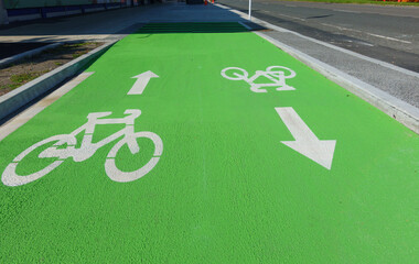 Cycleway street marking white on green background