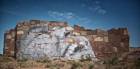 Puebloan ruins with representational artwork displayed, Navajo Nation