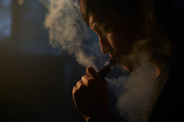 Man smoking electronic cigarette