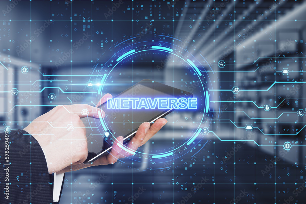 Poster close up of businessman hand pointing at tablet with glowing round circuit metaverse hologram on blu
