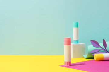 Concept of different office stationery with glue