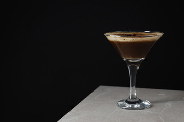 Espresso martini cocktail, delicious alcohol drink, space for text