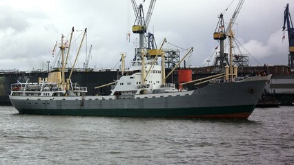 Naklejka premium Cargo Ship Cranes in Port Of Hamburg