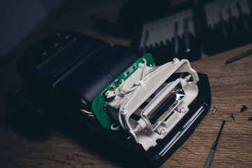 External camera flash repair service. Disassembles an electrical appliance, repairs photo flash