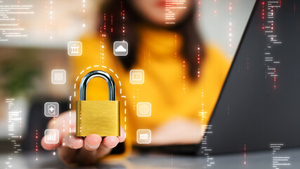 Cyber security protection concept of digital technology. Person holding a locked padlock surrounded...