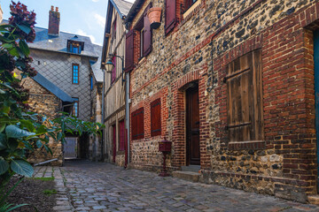 Honfleur, Normandy. Old cozy street with timber framing houses. Architecture and landmarks of Honfleu