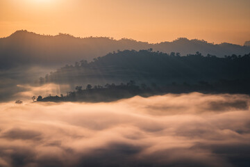 The sunrise over the mountain with sea of fog in the western of Thailand (Kanchanaburi province)