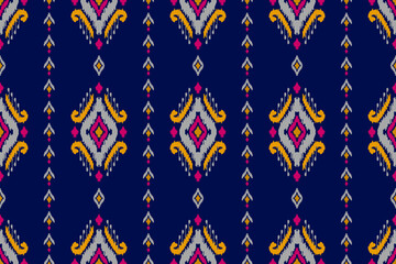 Ethnic ikat seamless pattern in tribal. American, Mexican style. Aztec geometric ornament print. Design for background, wallpaper, illustration, fabric, clothing, carpet, textile, batik, embroidery.