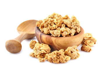 Granola, crunchy muesli isolated on white background with clipping path, macro collection.