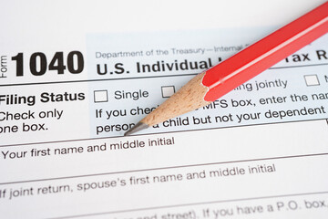Obraz premium Tax form 1040 U.S. Individual Income Tax Return, business finance concept.