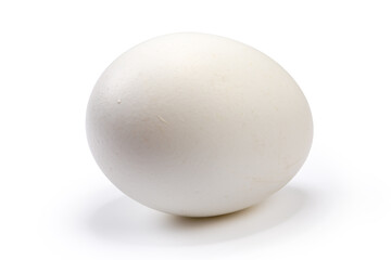 Whole white chicken egg on a white background