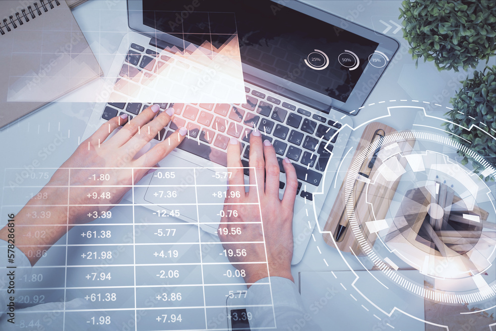 Poster double exposure of woman hands working on computer and forex graph hologram drawing. top view. finan