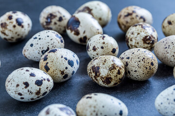 Fototapeta premium Easter quail eggs. Spring background with small easter quail eggs. Vintage photo processin
