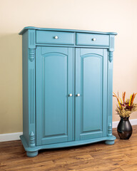 Vertiko in blue color after renovation. Do it yourself project