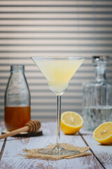 Bee's knees martini cocktail. Martini alcoholic cocktail or non-alcoholic mocktail. Martinis.