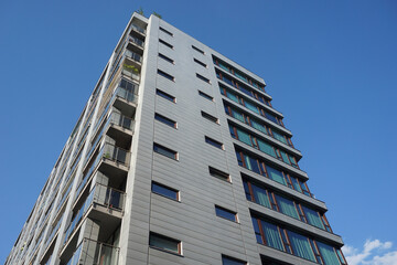 Obraz premium Modern residential building with balconies. Real estate and housing issues concept.