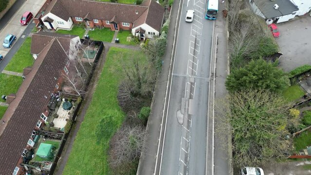 Cars  avoiding  large potholes Essex UK road overhead birds eye drone aerial
