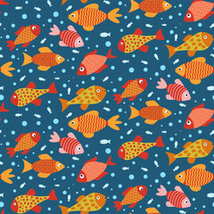 Colorful cute fish seamless pattern in orange, yellow, red and pink over dark blue background. For textile, fabric, home decor and wrapping paper. 