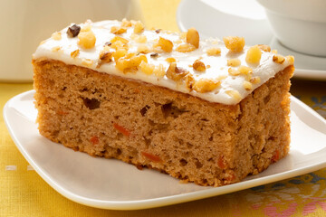  Piece of homemade carrot cake on a plate