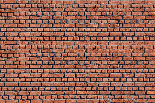 Old red brick wall. Brickwork texture