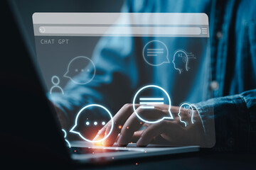 Businessman using laptop keyboard to chat with AI or Artificial Intelligence for chatbot by Open AI...