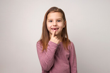 Cute smiling preschool girl portrait on white background