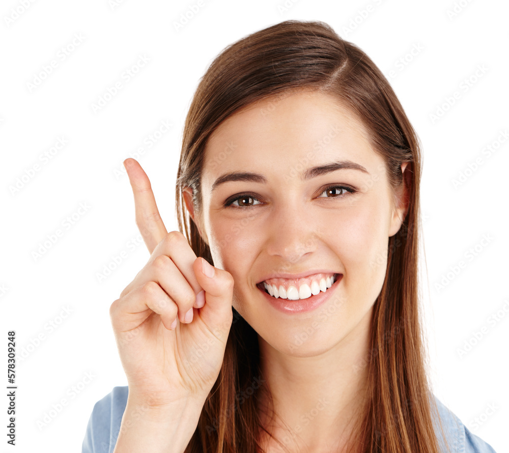 Canvas Prints Take a look at this. Studio shot of a beautiful young woman pointing towards copyspace against a white background.