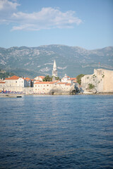 Seascape with old town Budva in the Adriatic sea for publication, design, poster, calendar, post, screensaver, wallpaper, postcard, banner, cover, website. High quality photo