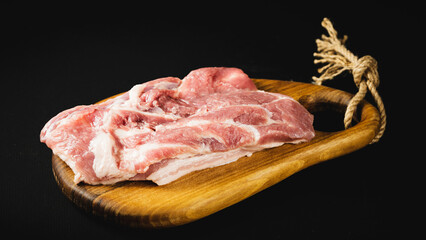 pork shoulder on a cutting board