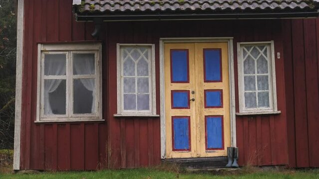 Colorful Door at Traditional Red Swedish House, Close Up