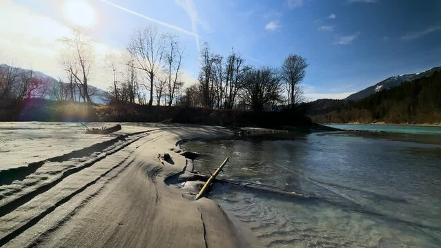 SLOMO - Flood tracks in the sand at the green Inn river in Tyrol