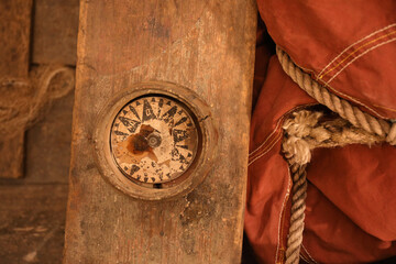 A close-up of an old broken compass on a boat  © RMMPPhotography