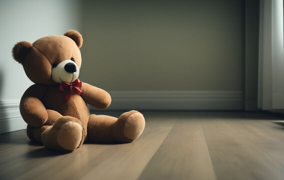 A sad teddy bear sits alone in a room. Neutral light green Background. The image symbolises loneliness or sadness. Header, Wallpaper and place for Text.
