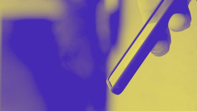 Duotone smartphone. Pop effect in digital technology. Smartphones and social activities and streaming video in pop colors. Two colors filtering smartphone