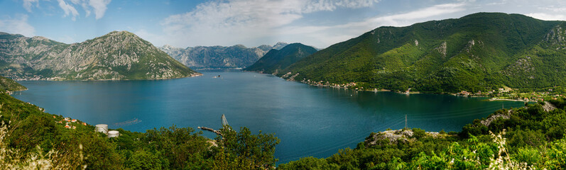 Fototapeta na wymiar Picturesque panorama from the observation point in the mountain road in Bay of Kotor