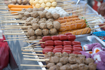 Various foods with sticks sold on the street in Bangkok