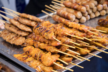 Street food market with grilled skewers food