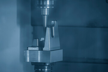 The CNC milling machine cutting injection mold part by solid ball end mill tool.