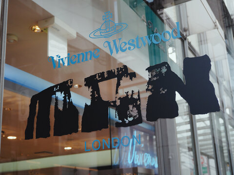 TOKYO, JAPAN - March 1, 2023: Sign on the window of a Vivienne Westwood store in Tokyo's Omotesando area.
