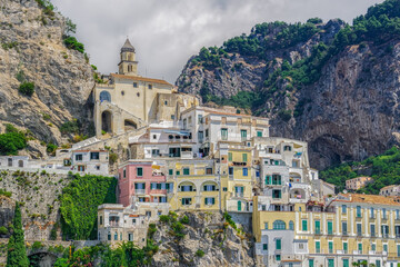 Amalfi Coast, Italy landscape view of low-rise traditional buildings at cliffs along the coastline...