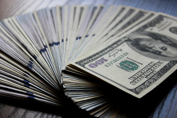 A lot of hundred dollar bills, close up, top view