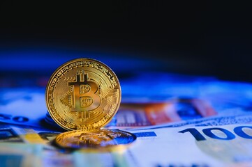 euro banknotes and coins, dollar banknotes with bitcoin. High quality photo.