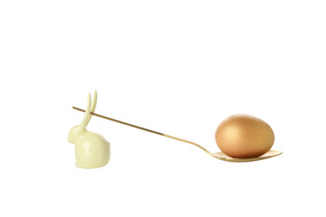 Concept of Richness, golden eggs, isolated on white background
