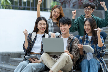Group of happy multiethnic colleagues shaking hands Express joy in the creative team. Friends or...